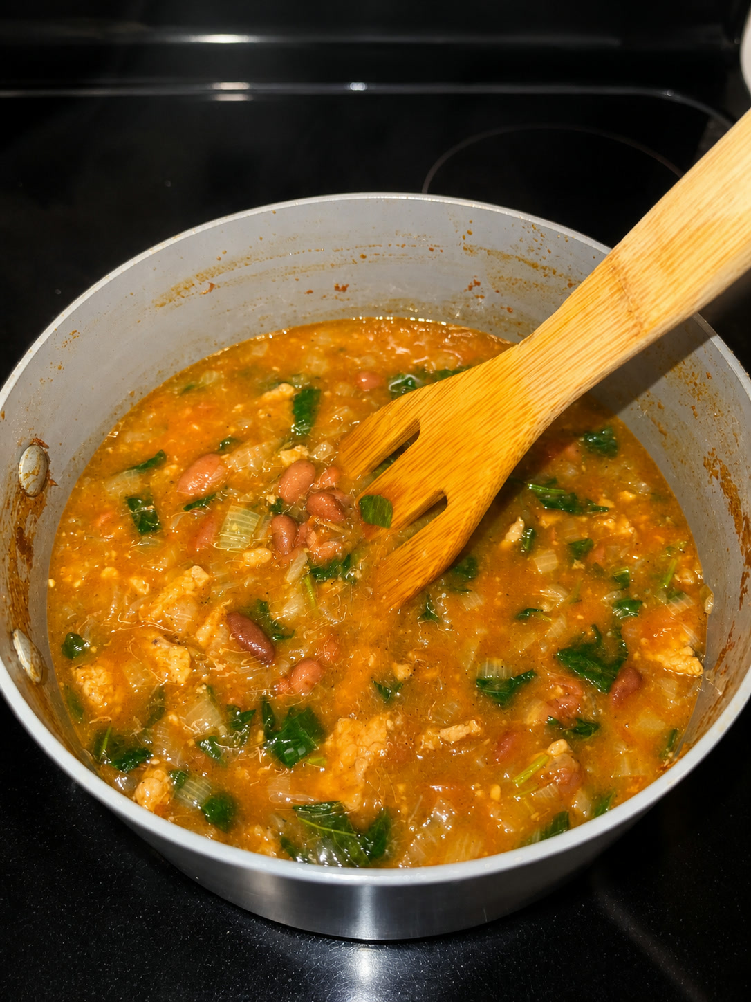 Beans simmering with kale